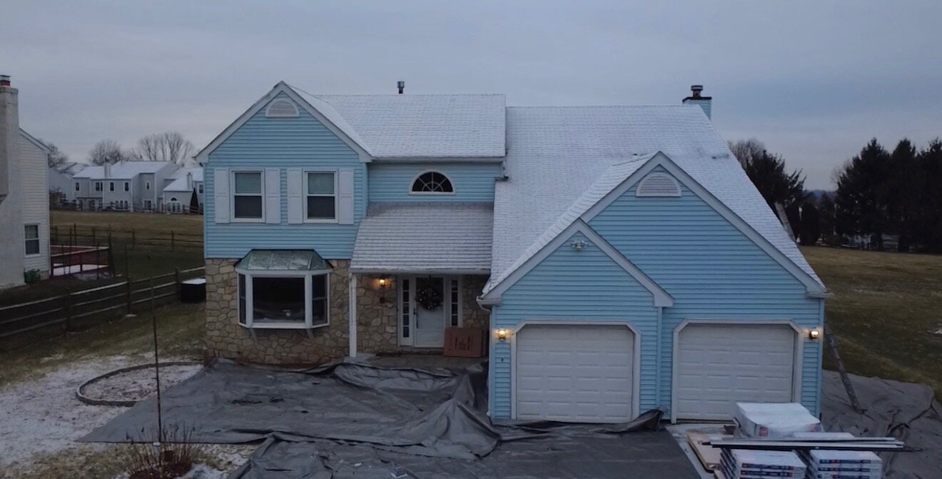 New siding & standing-seam metal roof — before